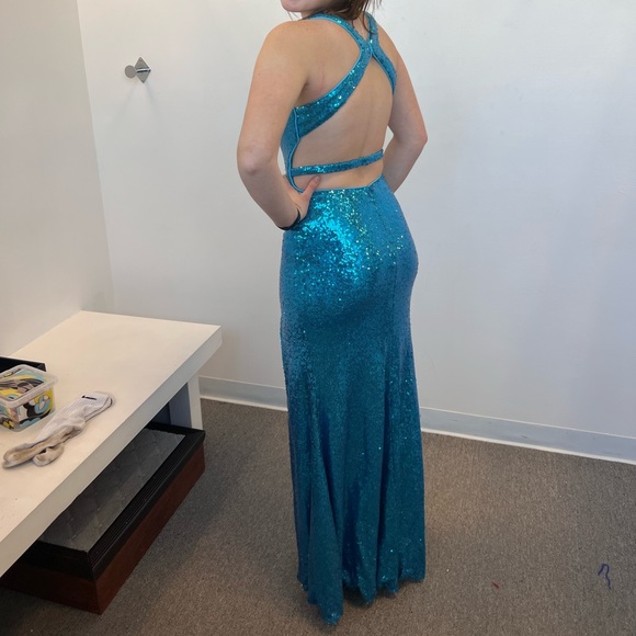 Teal sequin prom dress with an open back and a slit on the left leg - Picture 3 of 3